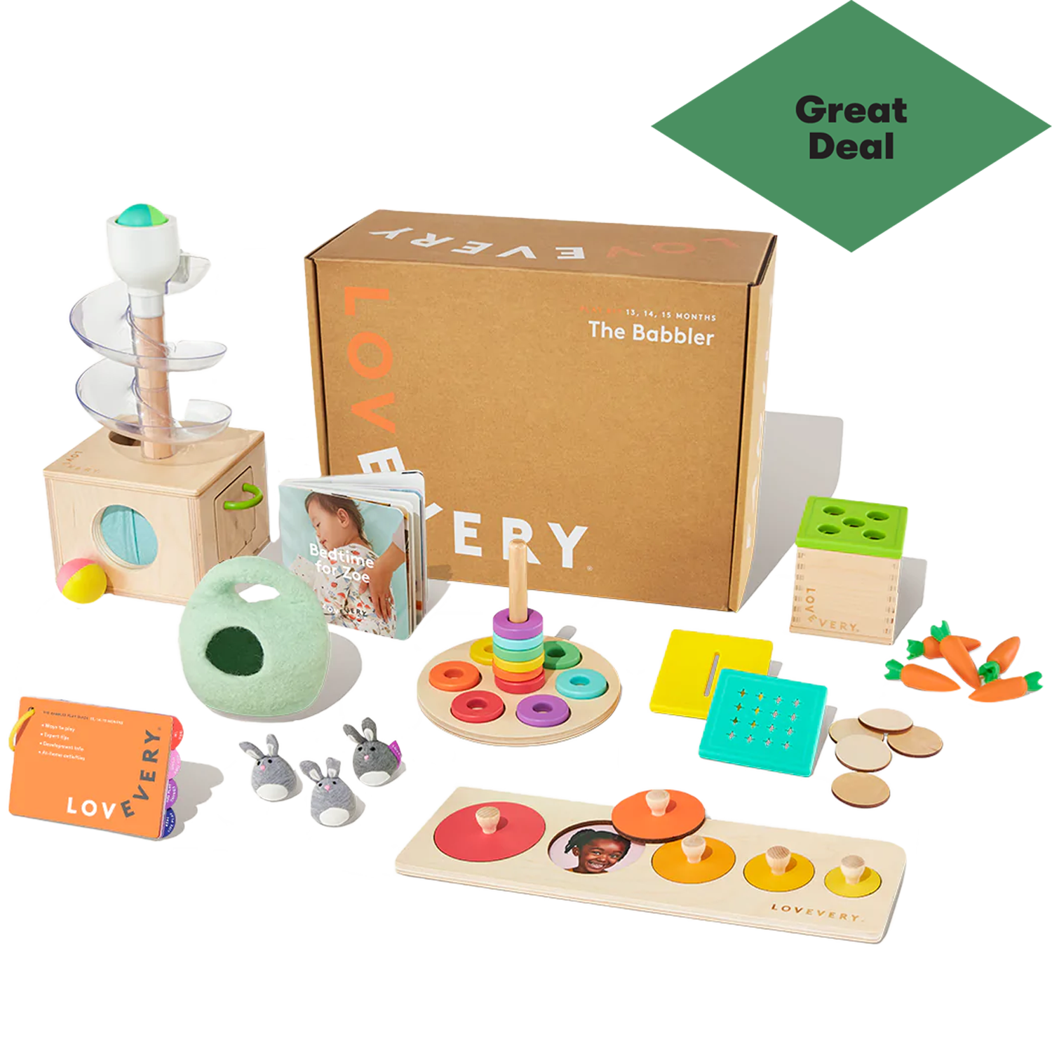 Lovevery subscription box with a bunch of toys laid out around it
