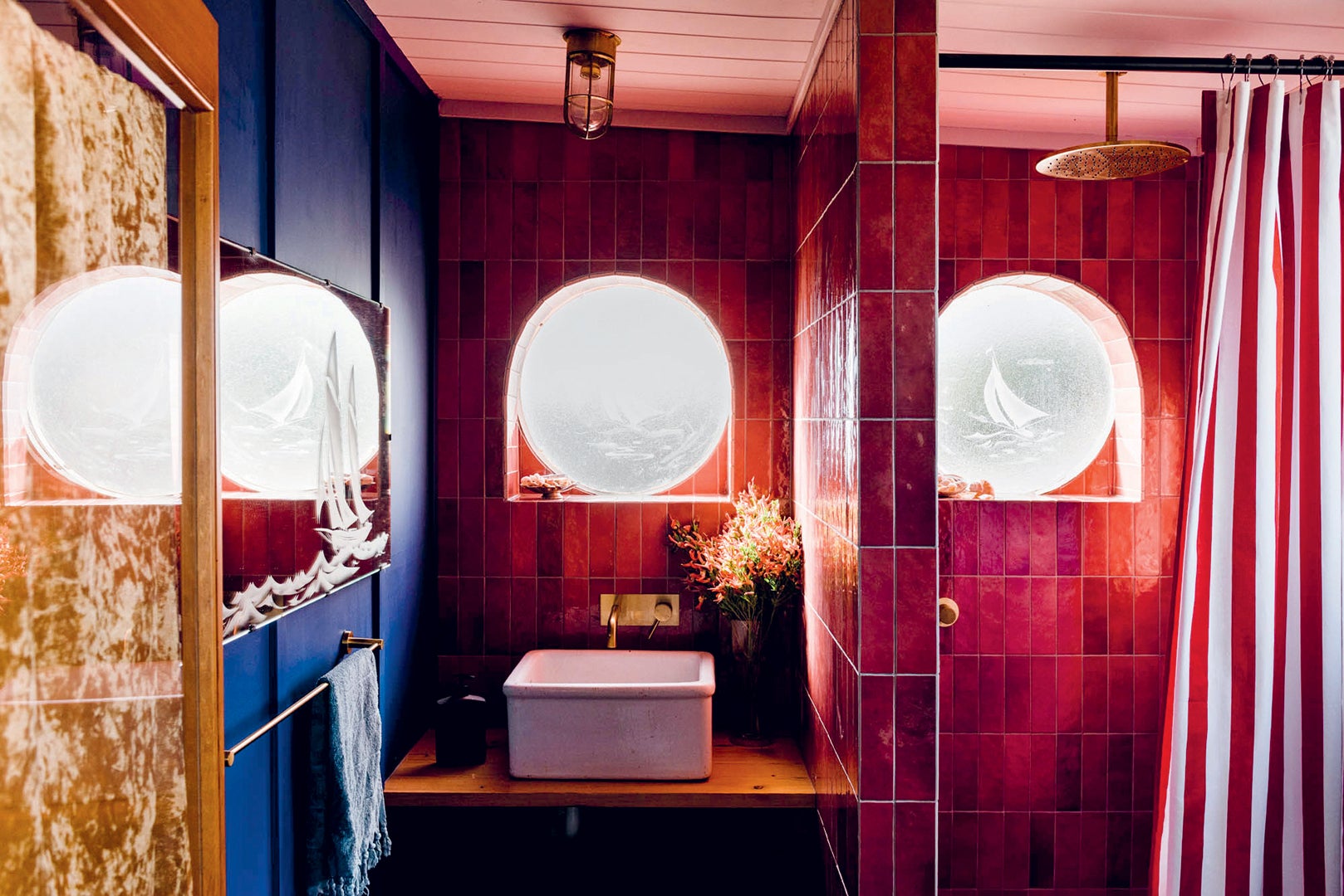 Bathroom with maroon tile