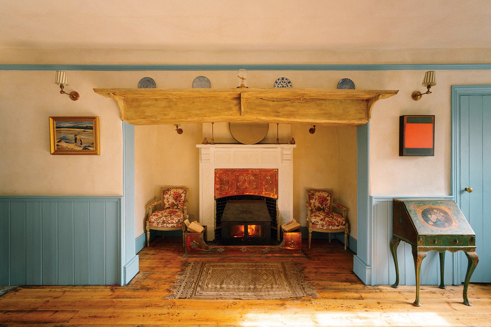 blue paneling around fireplace