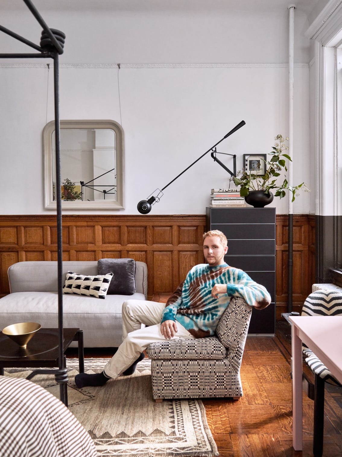 This Editor's Harlem Studio Is Closet-less and Tiny, But the Wainscoting Alone Makes Up for It