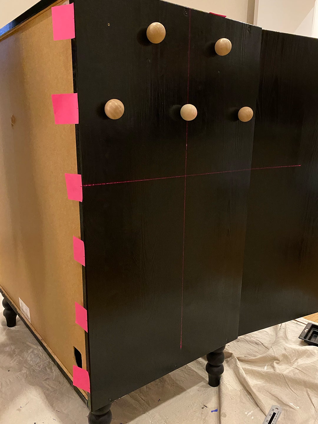 balls attached to cabinet