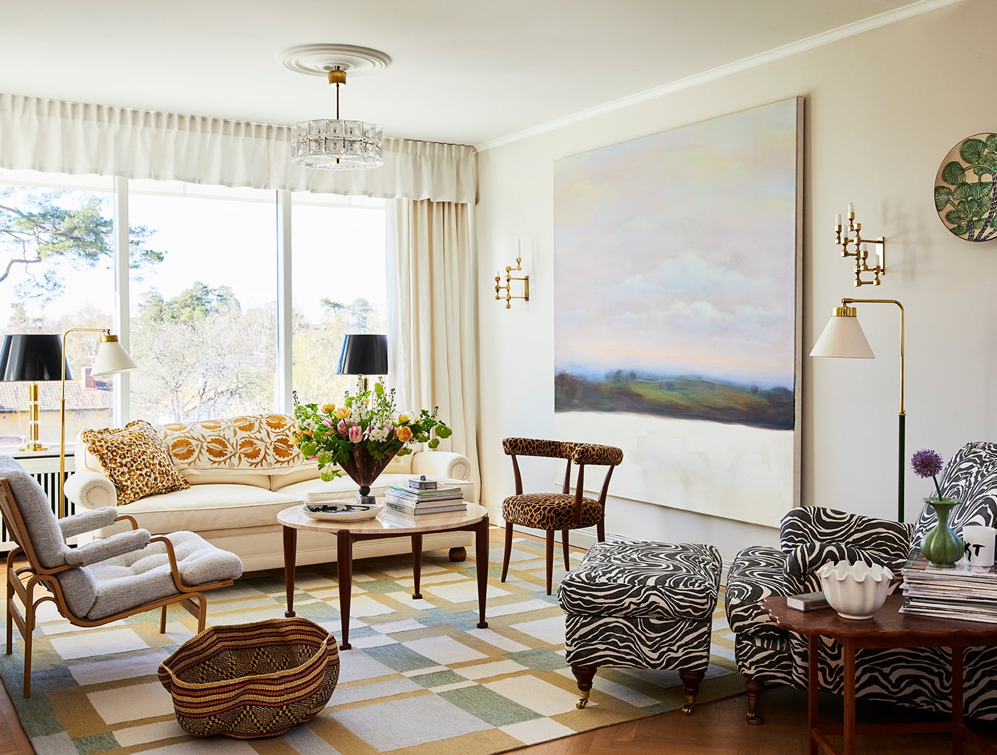 living room with large landscape art