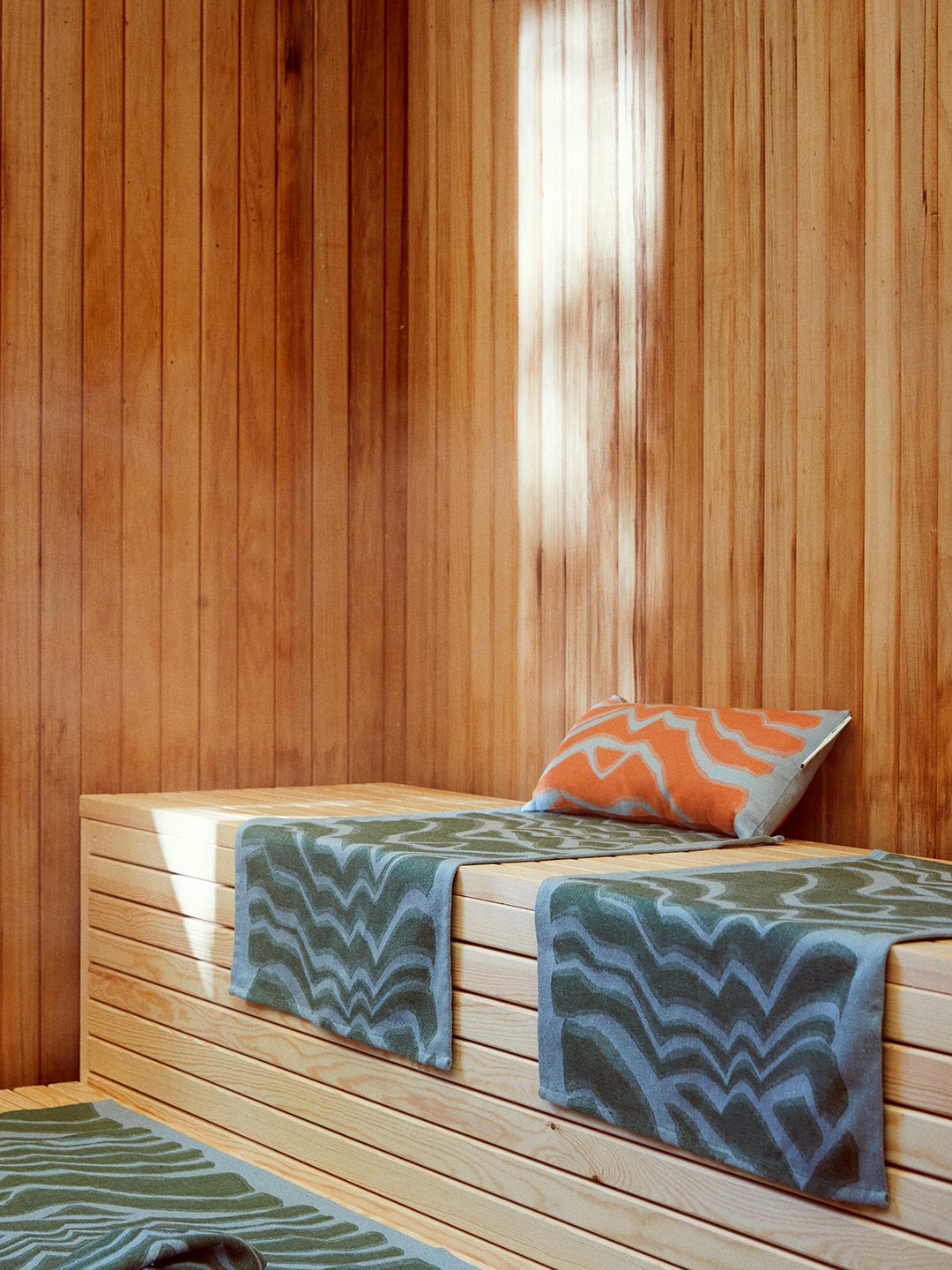 Sauna with towels and pillows
