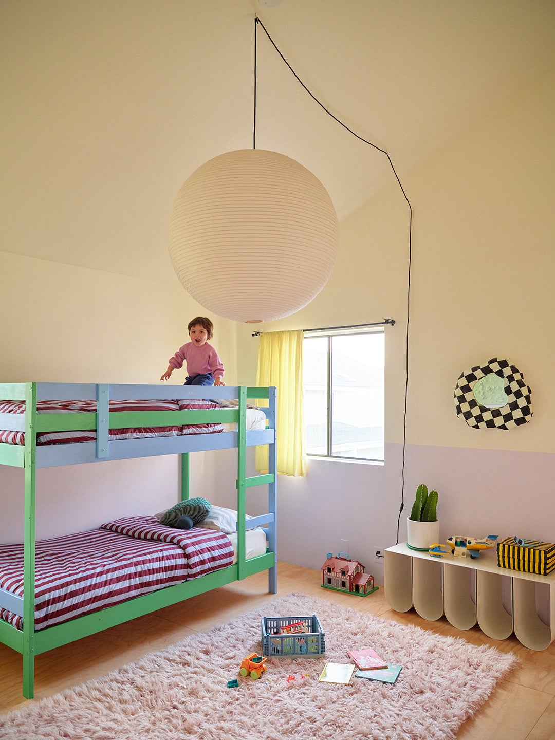 kid on bunk bed