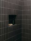 black shower tile