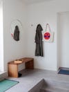 coat hooks and bench