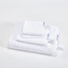 White set of towels folded up, a full set from Havly