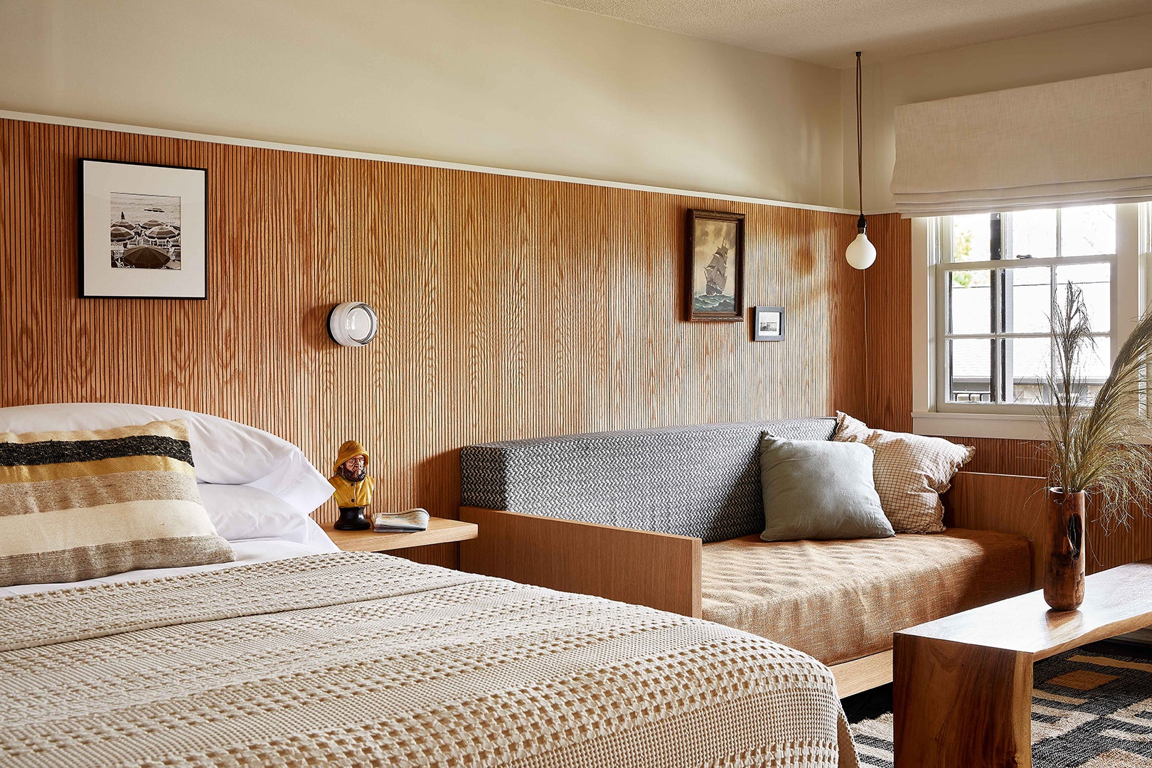 Original Pink Vintage Tile and Knotty Pine Walls Made the Cut in This 1950s Motel Reno