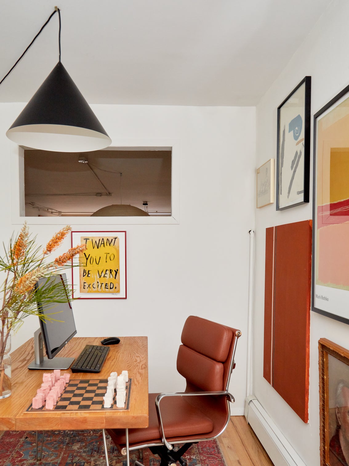 office with cone lamp over it