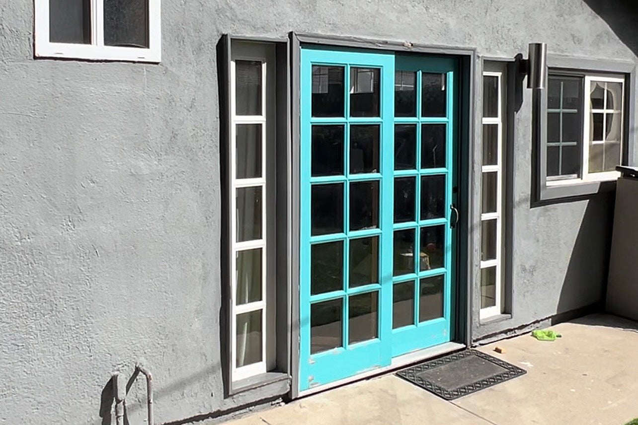 blue doors and gray walls