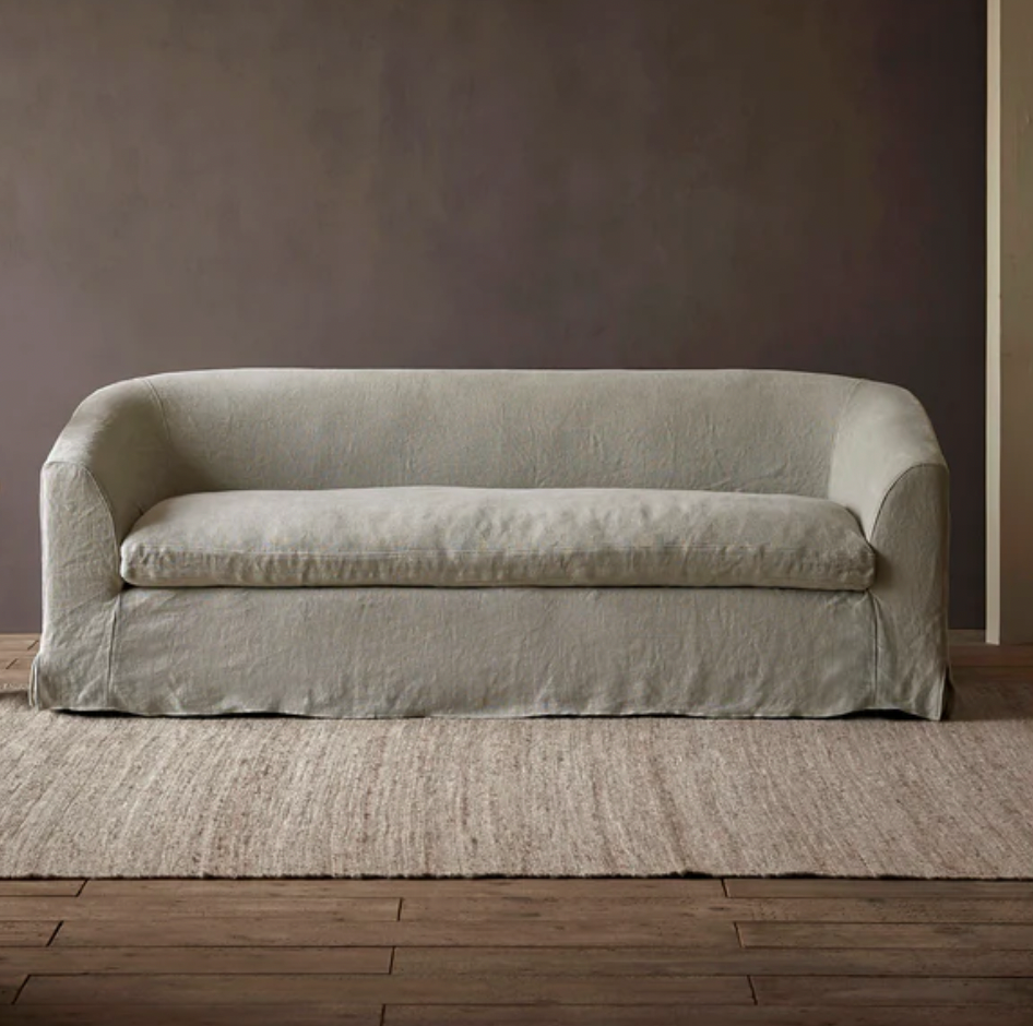 rounded sofa with skirt