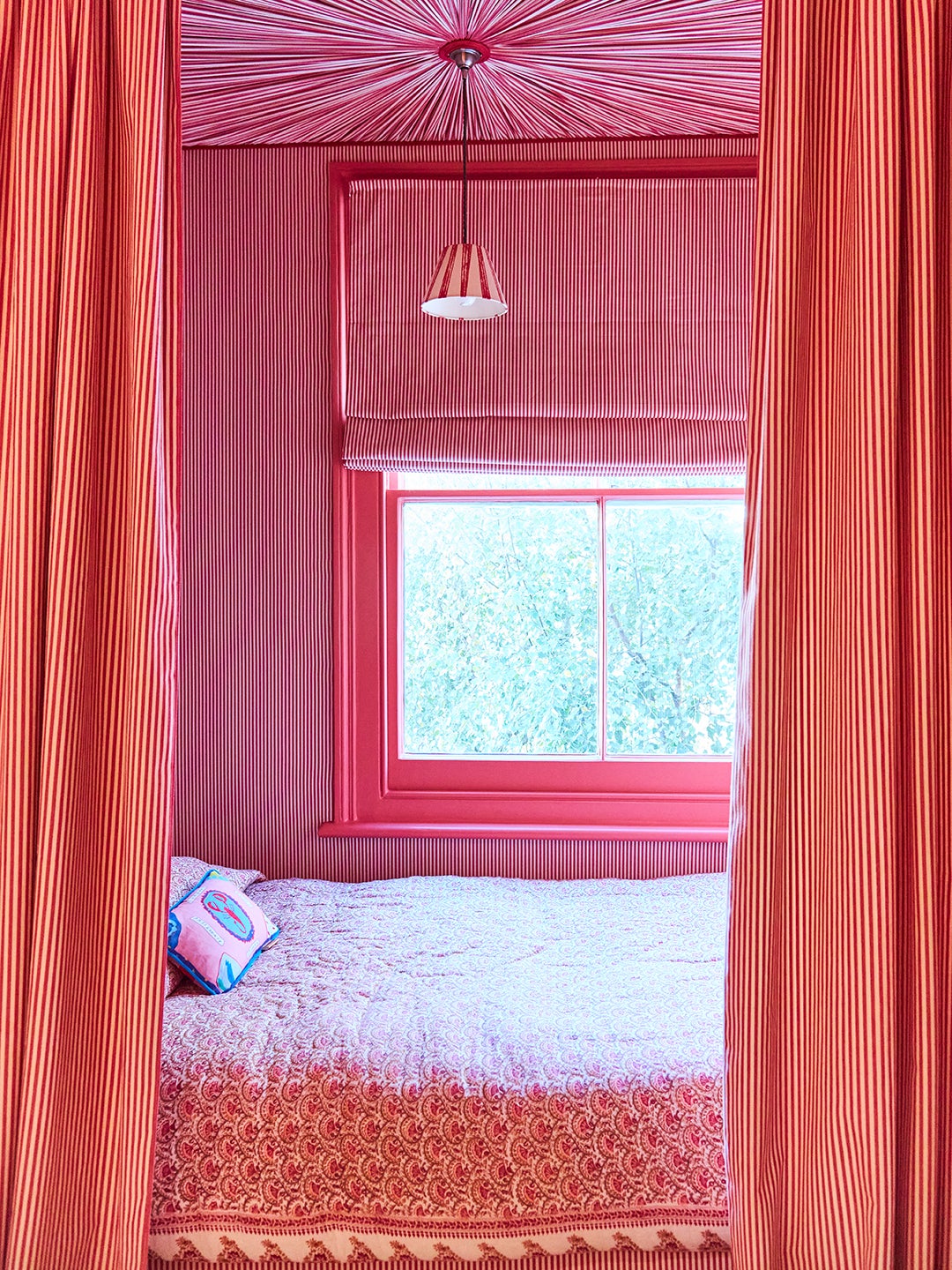 red striped bed nook with matching window shade
