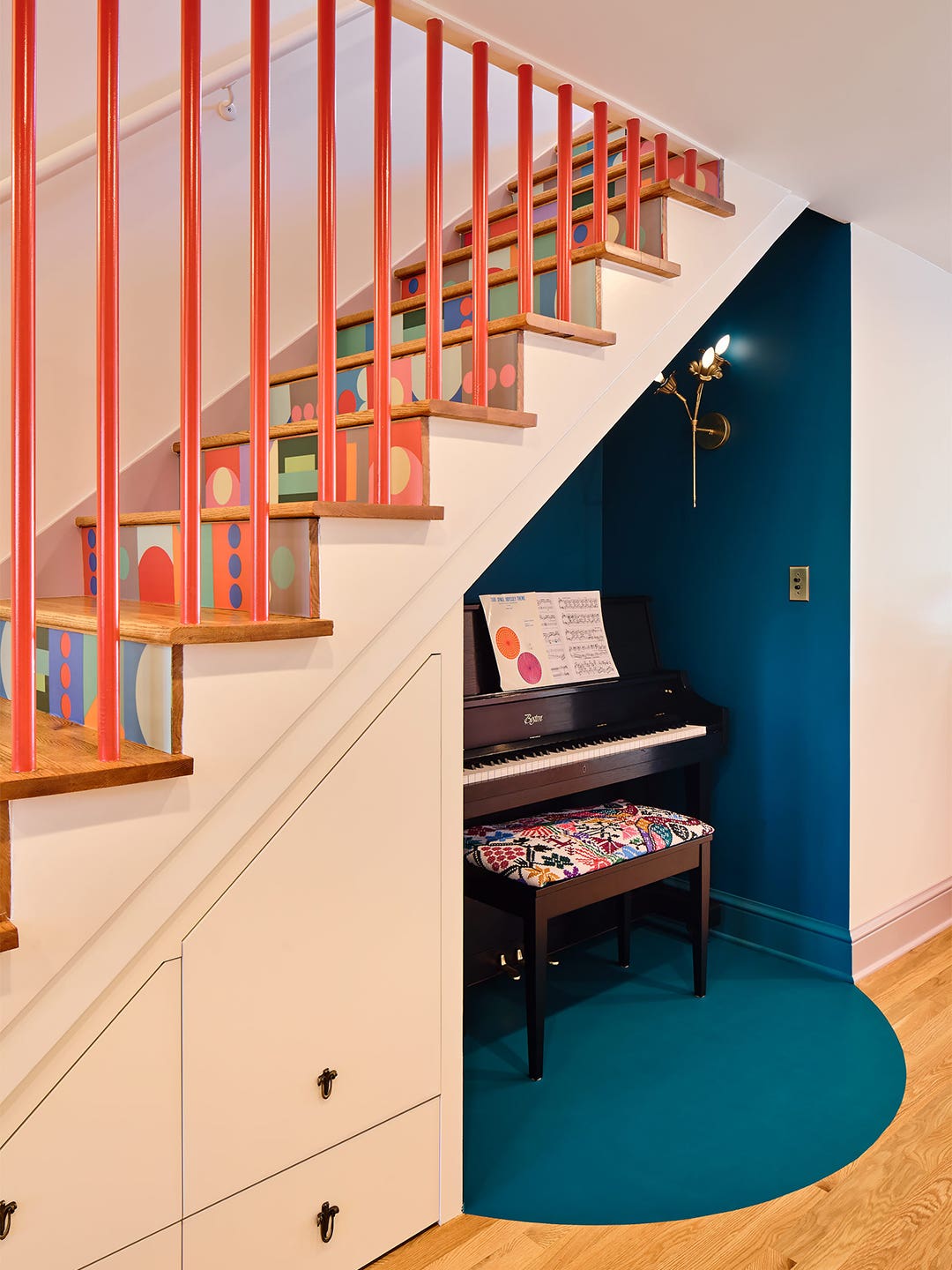 Bauhaus-Inspired Vinyl Made This Colorful Home’s Stairwell the Happiest Place