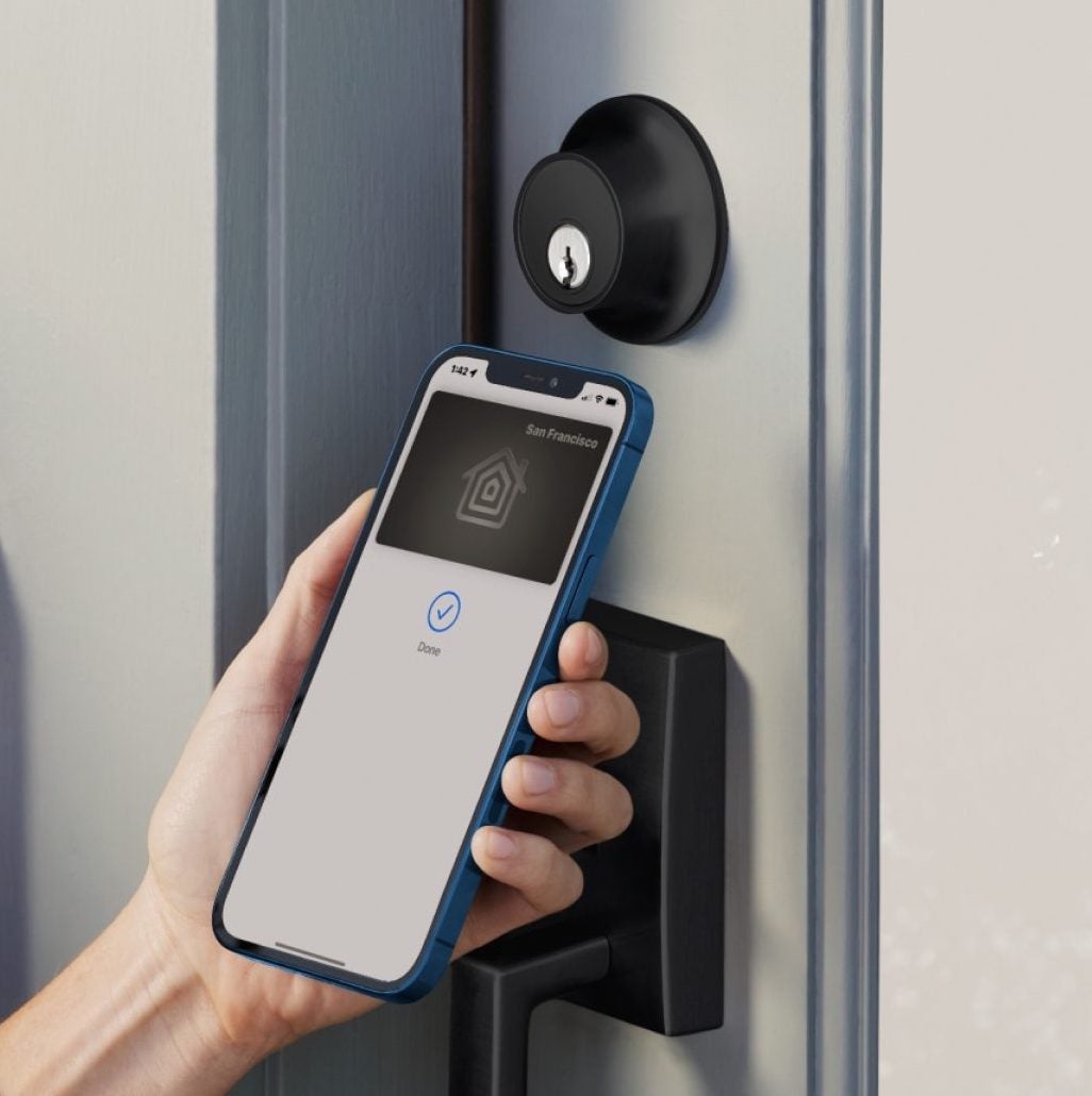 iphone held up to Level smart lock