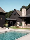 black house with pool