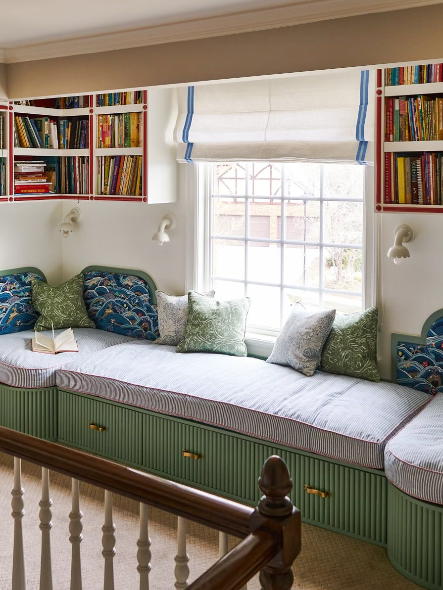 seafoam green reading nook with striped cushions