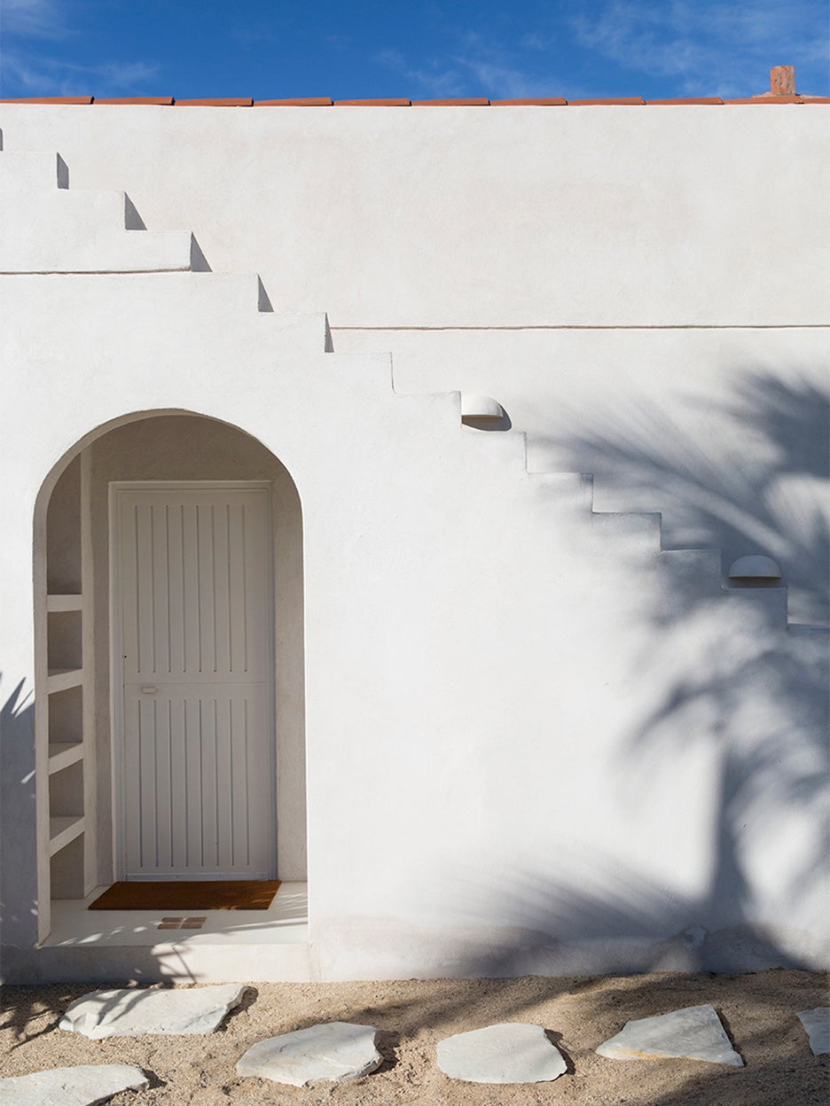 adobe-style white home exterior
