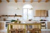 minimalist wood kitchen with yellow island