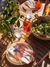 outdoor dinner table with salad bowl
