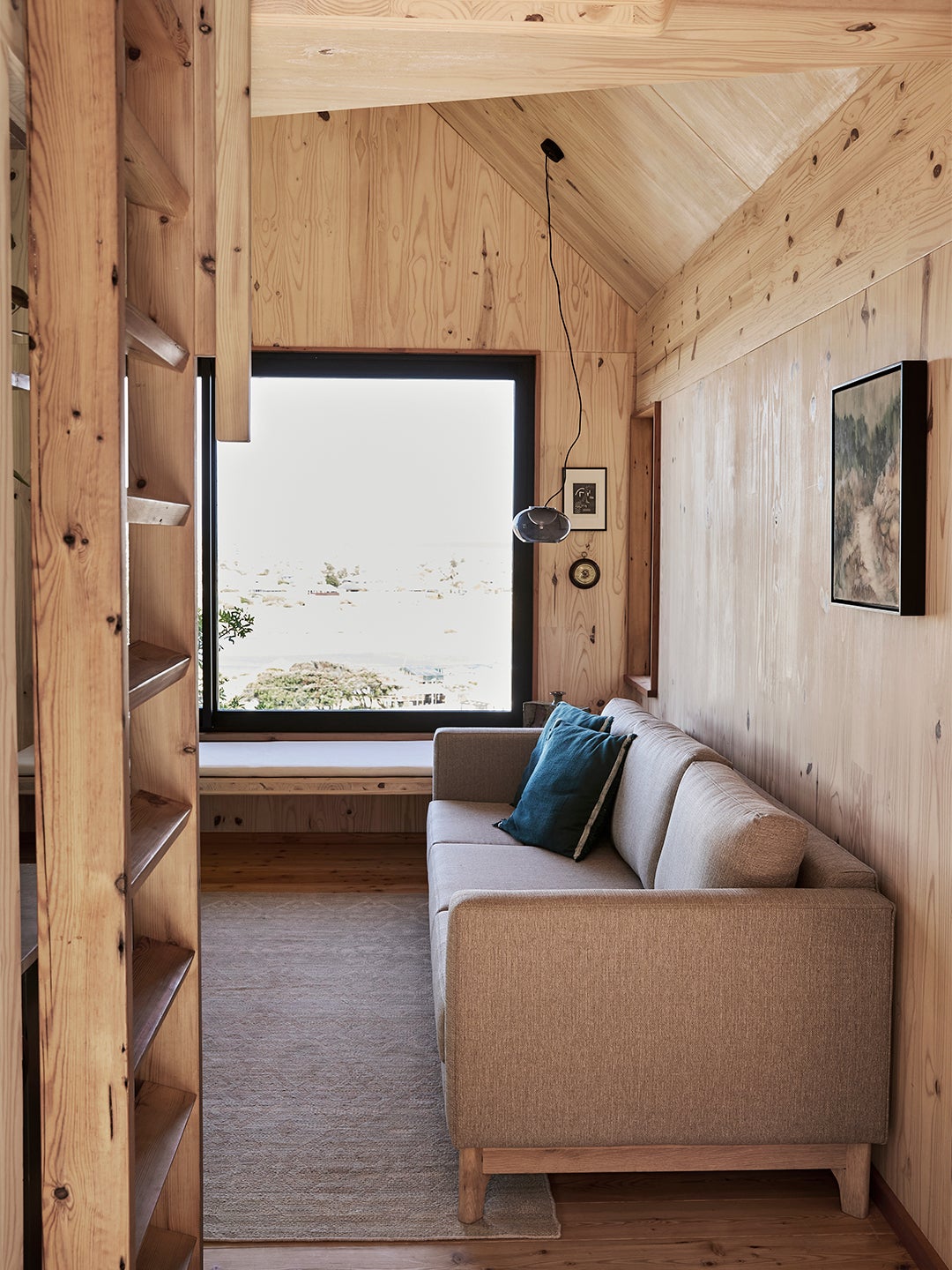gray sofa in wood house