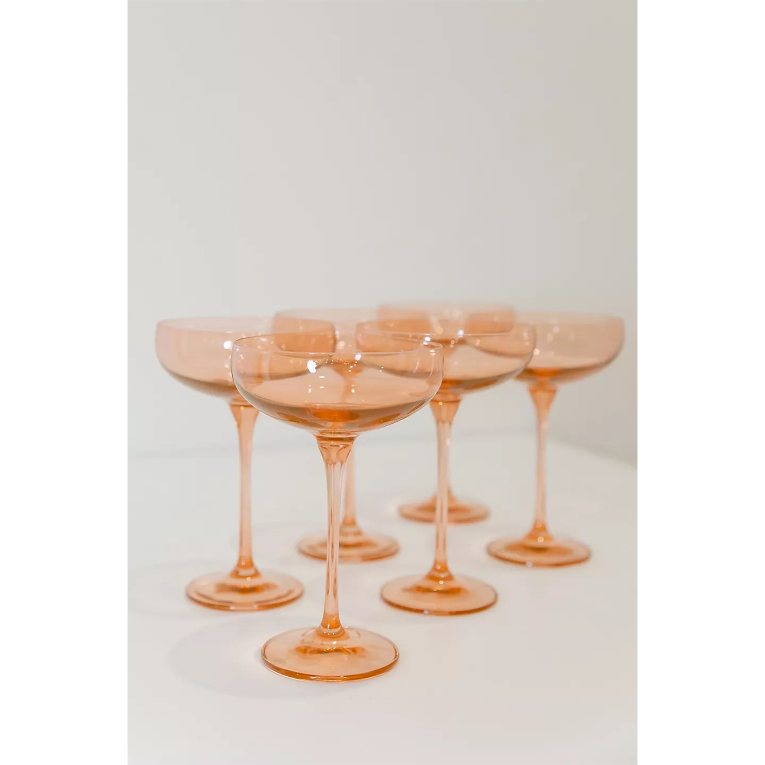 https://www.anthropologie.com/anthroliving/shop/estelle-colored-glass-champagne-coupe-set2?category=collection-kitchen-glassware&color=065