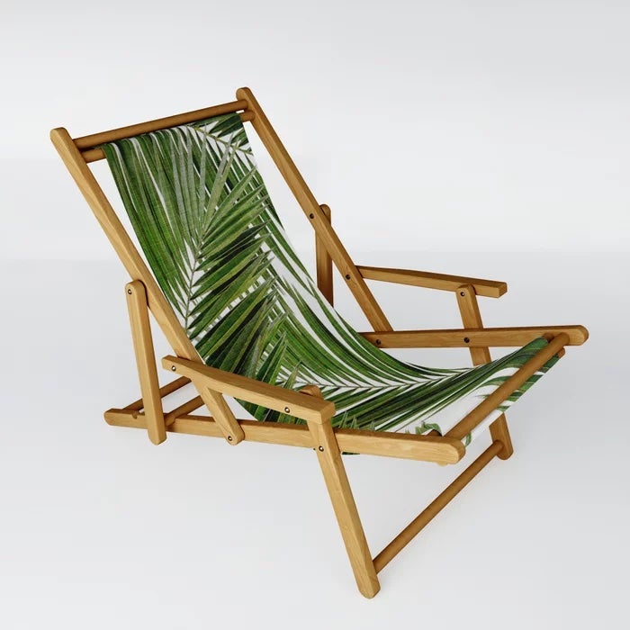 sling chair with palm leaf print