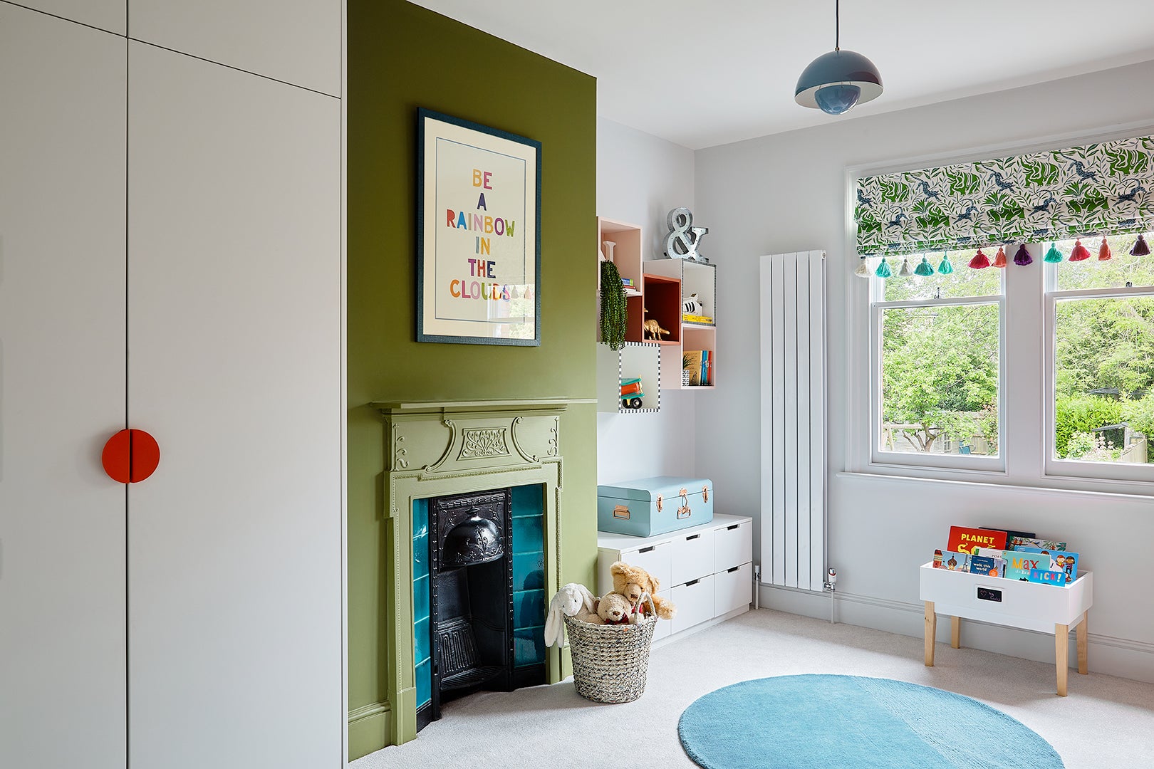 green color-blocked fireplace in kid's room