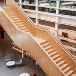 floating wood staircase in Google Design Lab