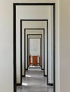 hallways with black-trimmed openings
