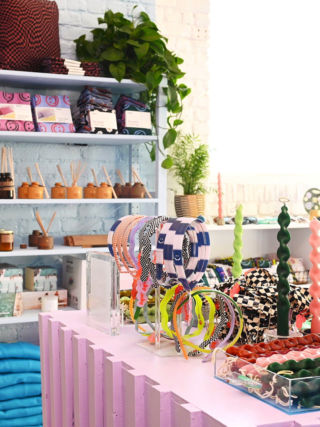 Shop with pink table and headbands on display