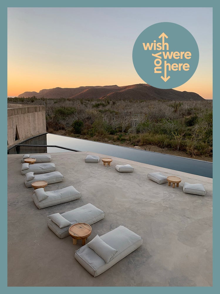 Infinity pool in the desert with the text: Wish you were here