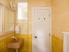 two tone yellow bathroom