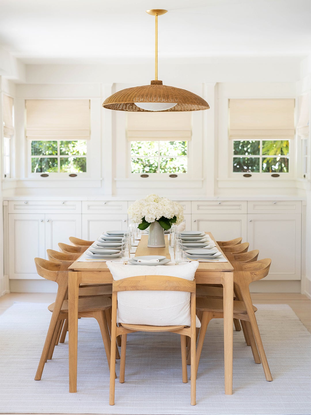 Dining room table with wooden chairs