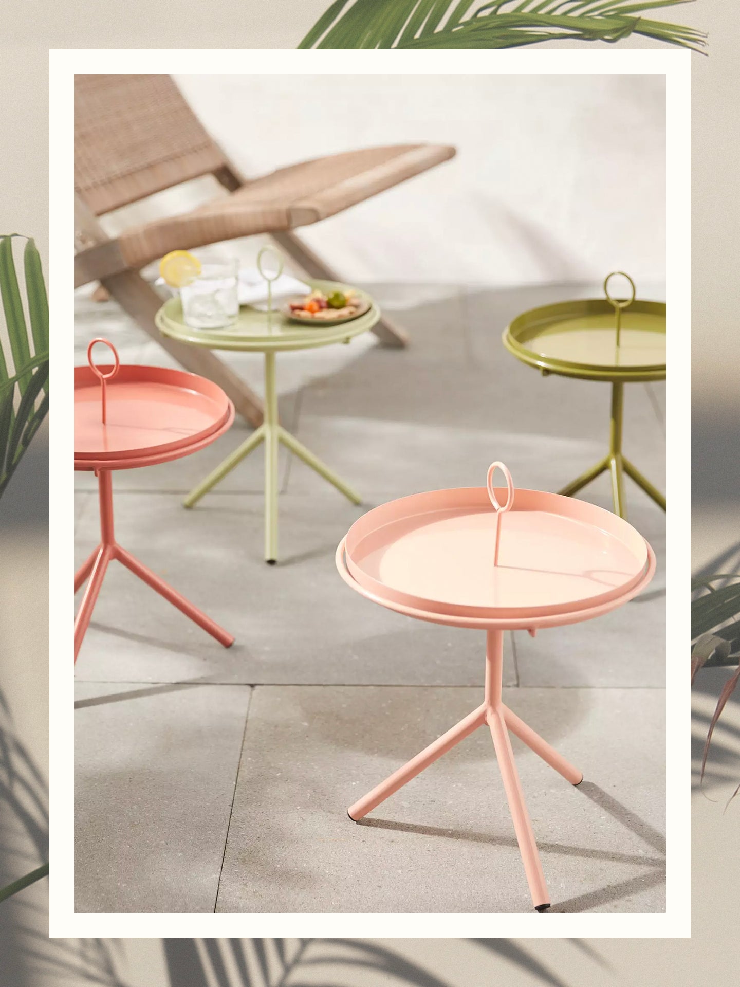 Outdoor side tables in powder-coated metal from Anthropologie.