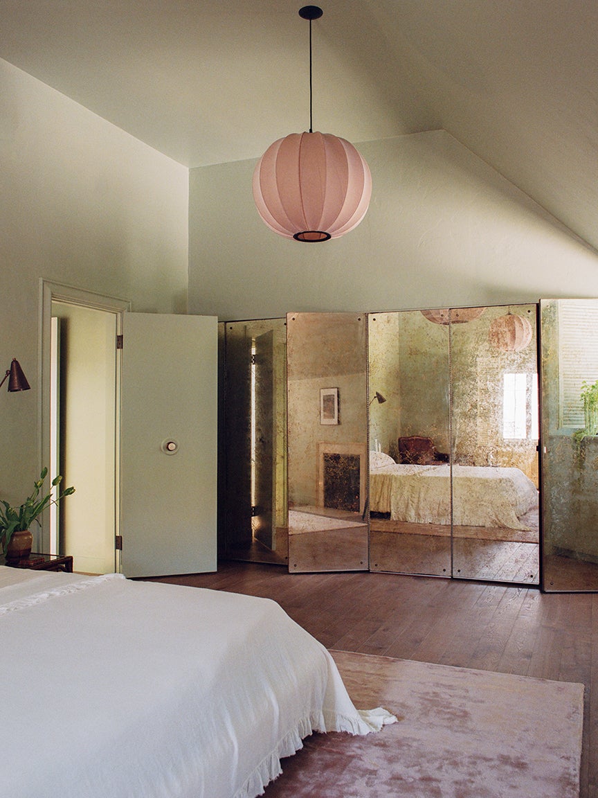mirror doors in green bedroom