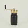 black and brass coffee grinder