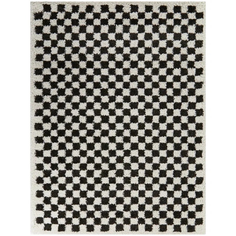 cream and black checkerboard rug
