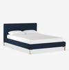 simple navy upholstered platform bed
