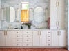 marble tile bathroom with terracotta floors