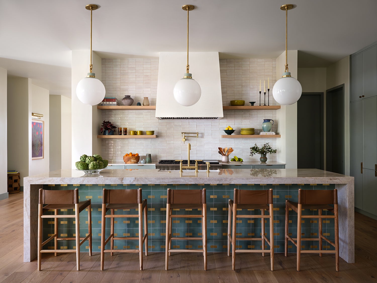 cream kitchen with green concrete tile island