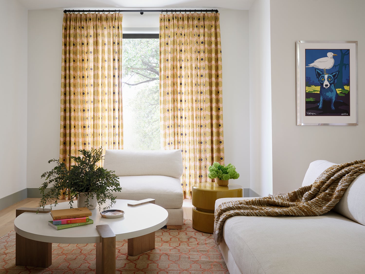 neutral living room with yellow curtains
