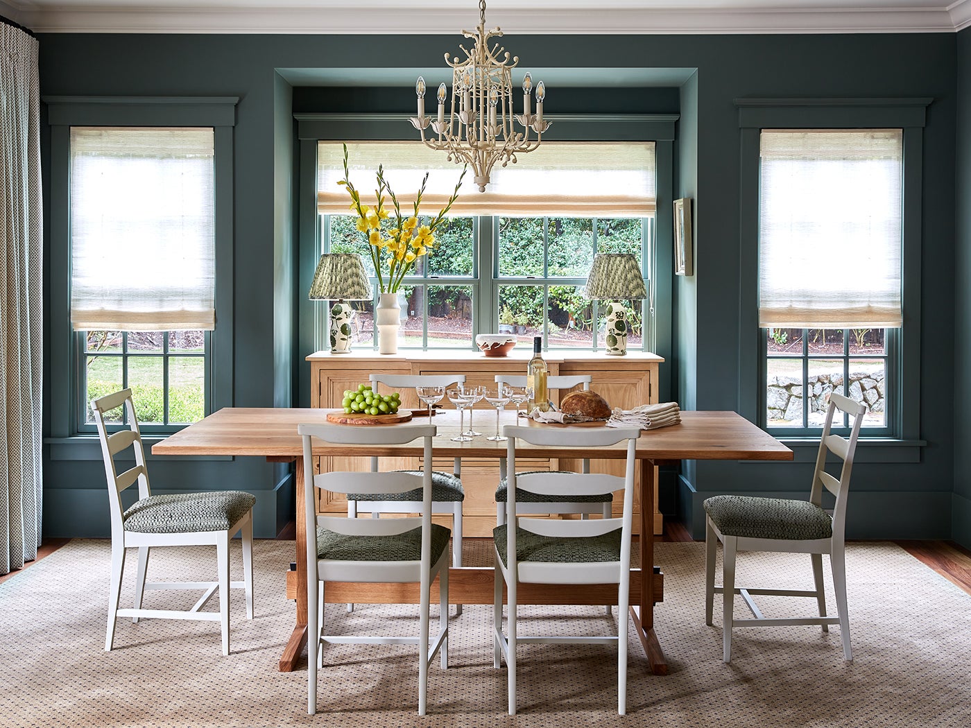 Formal dining room with green walls