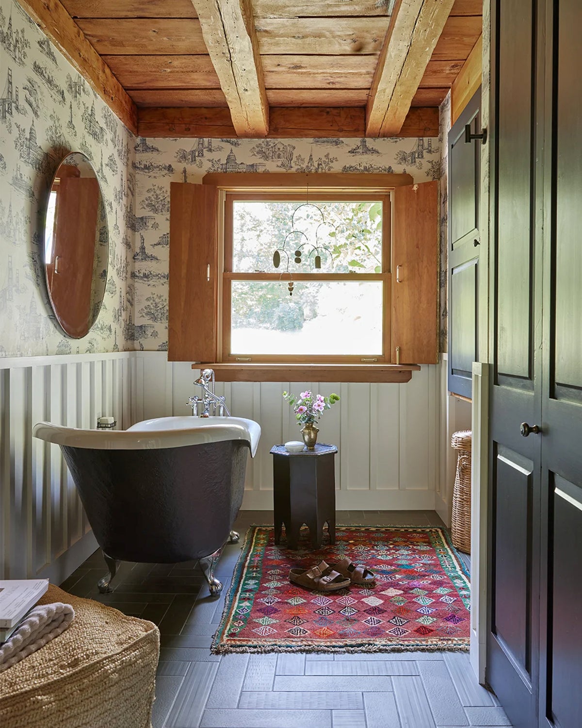 rustic bathroom with claw foot tub
