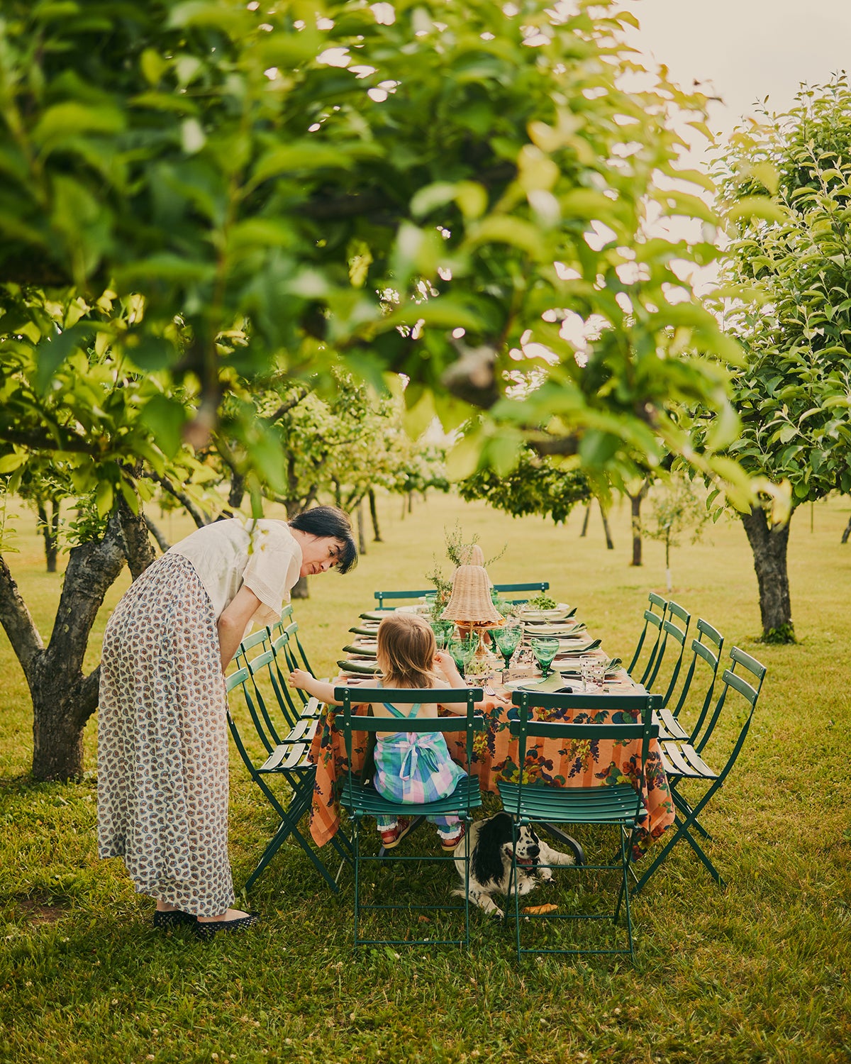 Woman and child at table outdoors