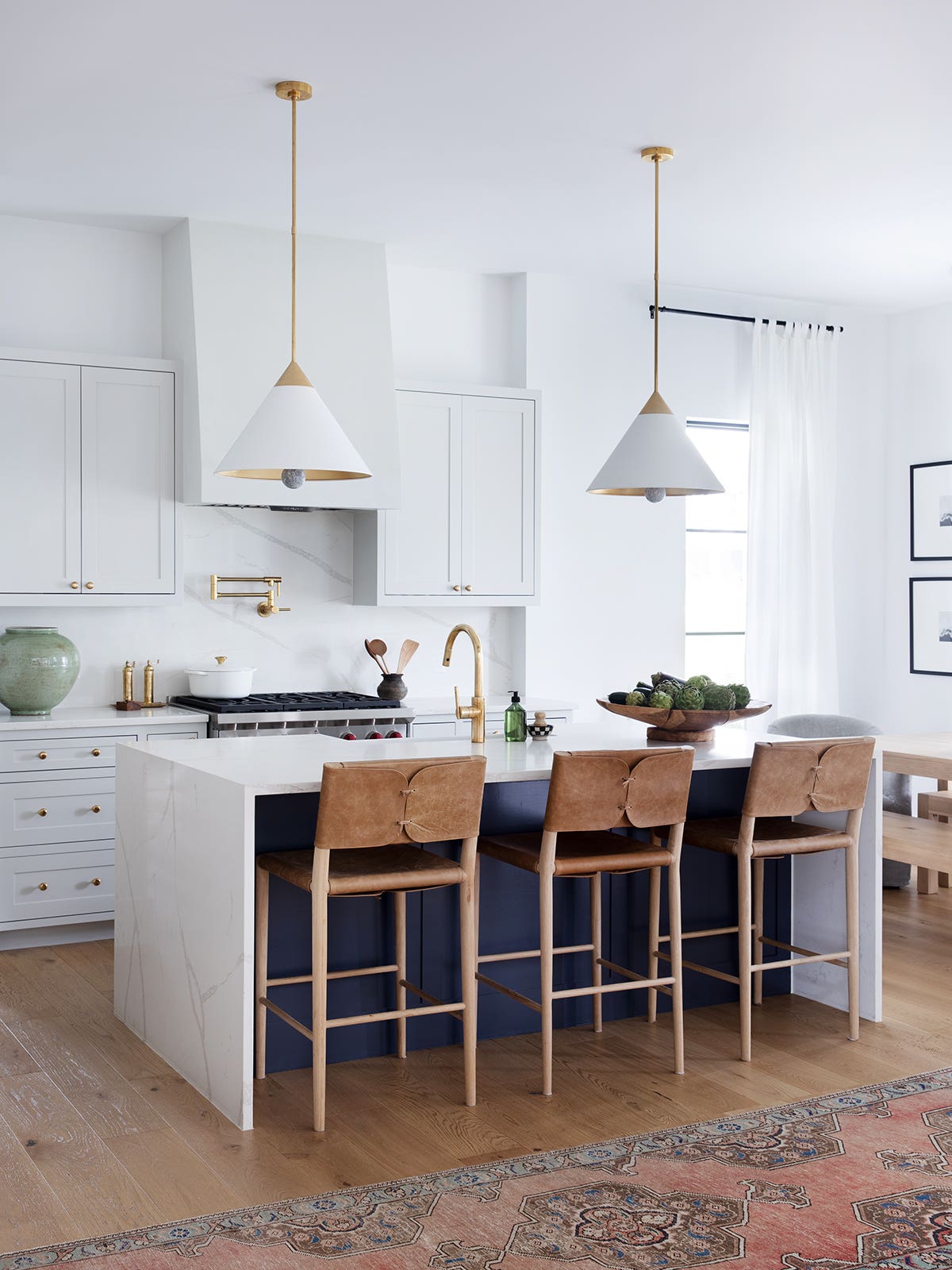 white and navy kitchen with island