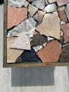 crushed tiles on table top