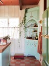 Corner cabinet painted mint green