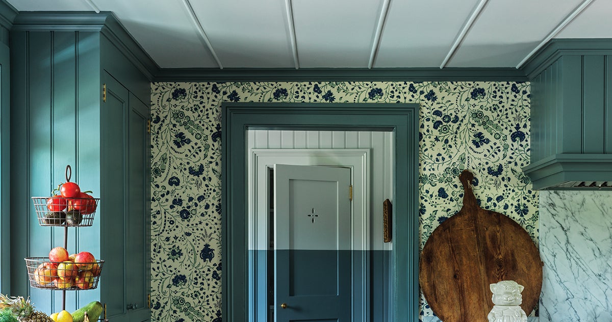 How These Designers Prevented Their Dark Blue Kitchen from Feeling Too Cold