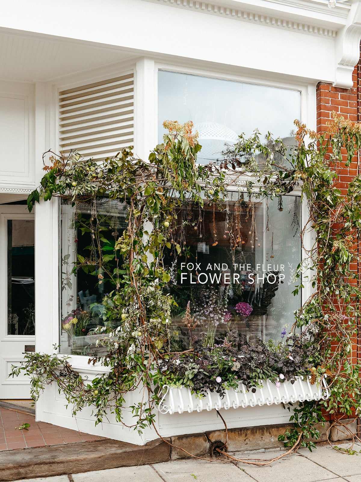 Exterior window of Fox and the Fleur flower shop