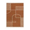 light brown rug with white emroidery